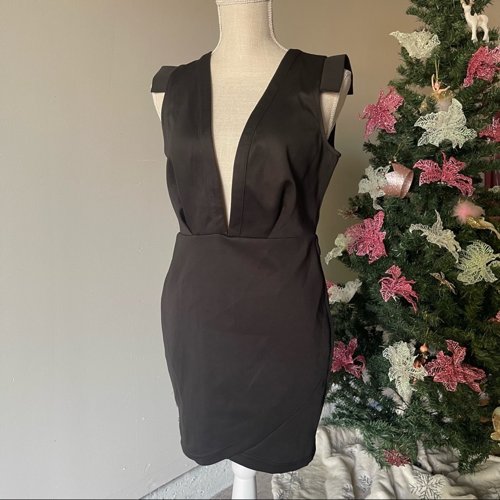 Xtaren black dress